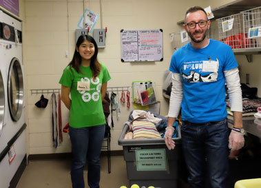 volunteers doing laundry