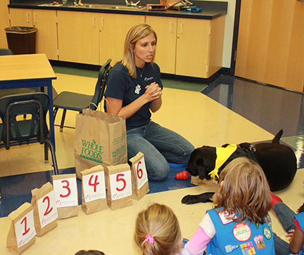 Humane education director teaching to a classroom of students