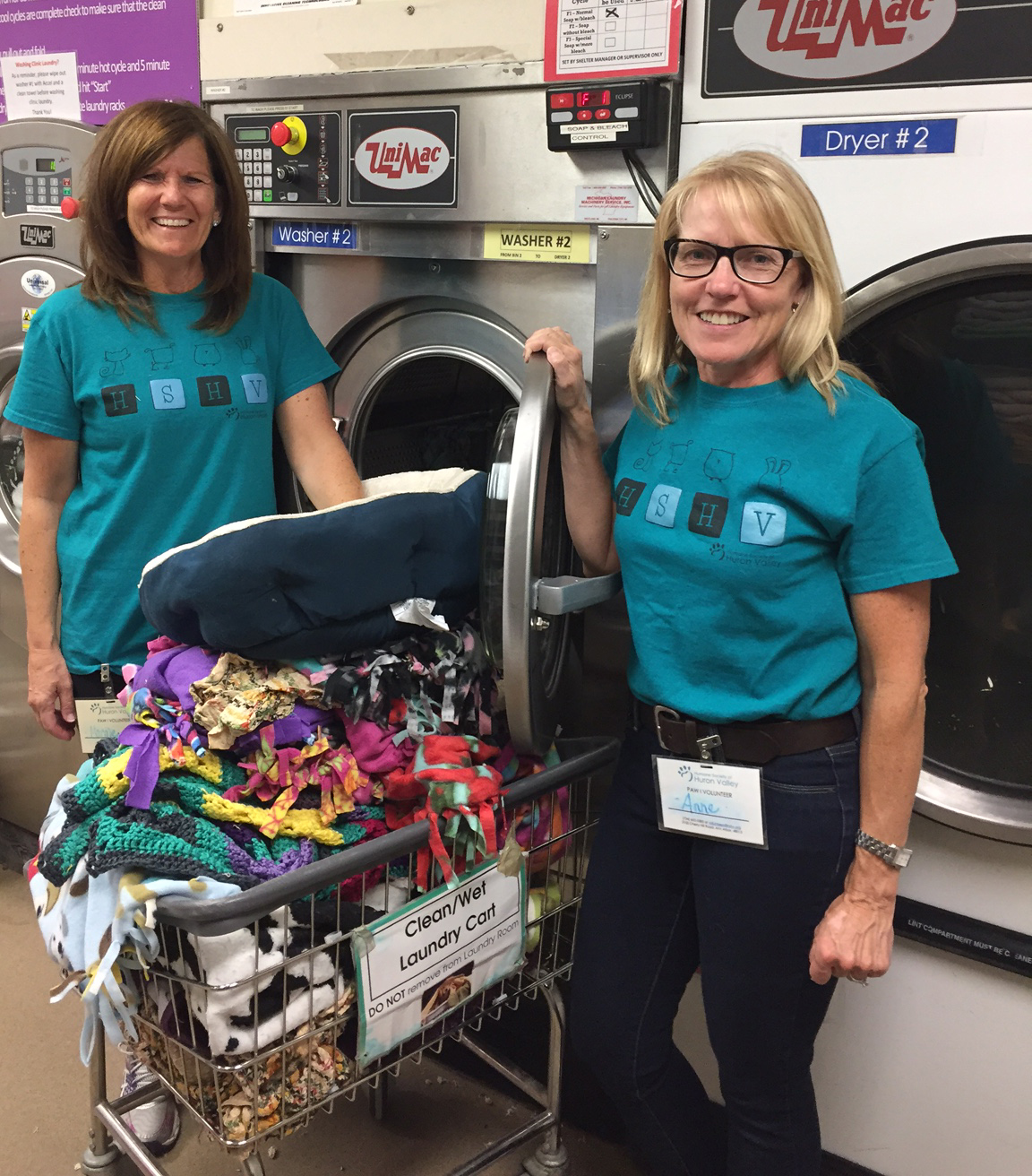 volunteers doing laundry